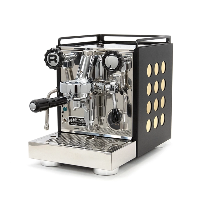 A matte black Rocket Espresso Appartamento Serie Nera Gold accents, highlighting its polka dot design