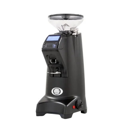 A portafilter resting in the adjustable fork of the Eureka Olympus 75E Espresso Grinder Black, ready for hands-free grinding