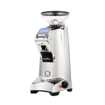 A portafilter resting in the adjustable fork of the Eureka Olympus 75E Espresso Grinder Chrome, ready for hands-free grinding