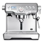 A sleek, Breville BES920XL Dual Boiler Stainless espresso machine, highlighting its dual gauges and modern design