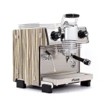 A sleek, Dalla Corte Mina Espresso Machine Green, showcasing its distinctive manual lever (yoke) and modern design