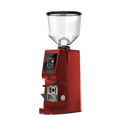 A sleek, Eureka Atom Excellence 65 Red espresso grinder on a countertop, highlighting its sturdy build