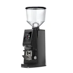 A sleek, Eureka Atom Excellence 75 Black espresso grinder on a countertop, emphasizing its sturdy build and modern appearance