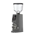 A sleek, Eureka Atom Excellence 75 Grey espresso grinder on a countertop, emphasizing its sturdy build and modern appearance