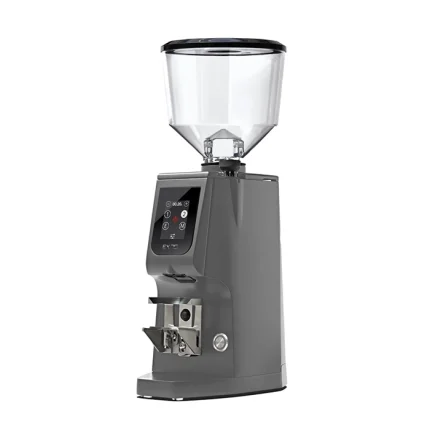 A sleek, Eureka Atom Excellence 75 Grey espresso grinder on a countertop, emphasizing its sturdy build and modern appearance