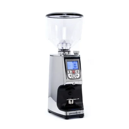 A sleek, Eureka Atom Specialty 65 Chrome espresso grinder on a kitchen counter, highlighting its compact design