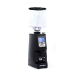 A sleek, Eureka Atom Specialty 75 black espresso grinder on a kitchen counter, showcasing its design