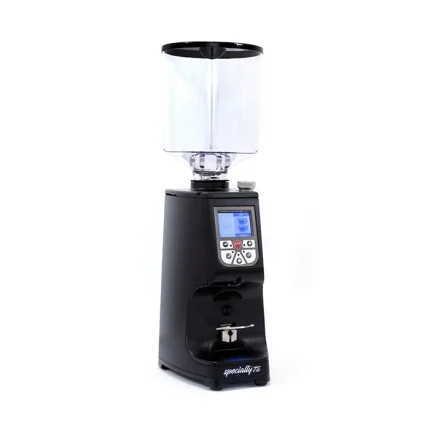 A sleek, Eureka Atom Specialty 75 black espresso grinder on a kitchen counter, showcasing its design