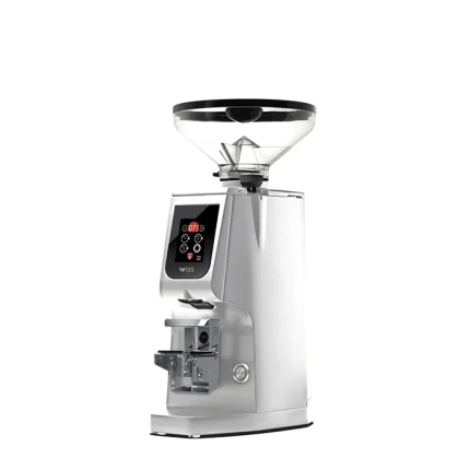 A sleek, Eureka Atom W 65 espresso grinder Chrome on a counter, highlighting its compact design