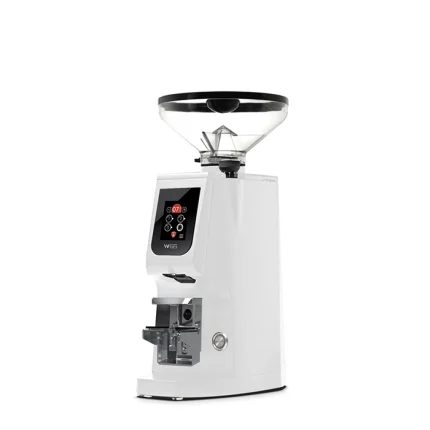 A sleek, Eureka Atom W 65 espresso grinder White on a counter, highlighting its compact design