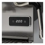 A sleek, Profitec GO Espresso Machine Stainless Steel on a countertop, showcasing its compact size and front panel controls