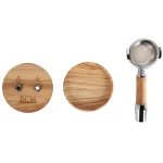 A view of the ECM Puristika Espresso Machine with its external glass water tank positioned to the side, demonstrating its flexible placement