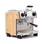 Close-up of the Dalla Corte Mina Espresso Machine Oak right side, displaying the series of lights indicating flow rate stages during extraction