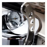 Close-up of the Dalla Corte Mina Espresso Machine White right side, displaying the series of lights indicating flow rate stages during extraction