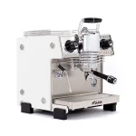 Close-up of the Dalla Corte Mina Espresso Machine White right side, displaying the series of lights indicating flow rate stages during extraction